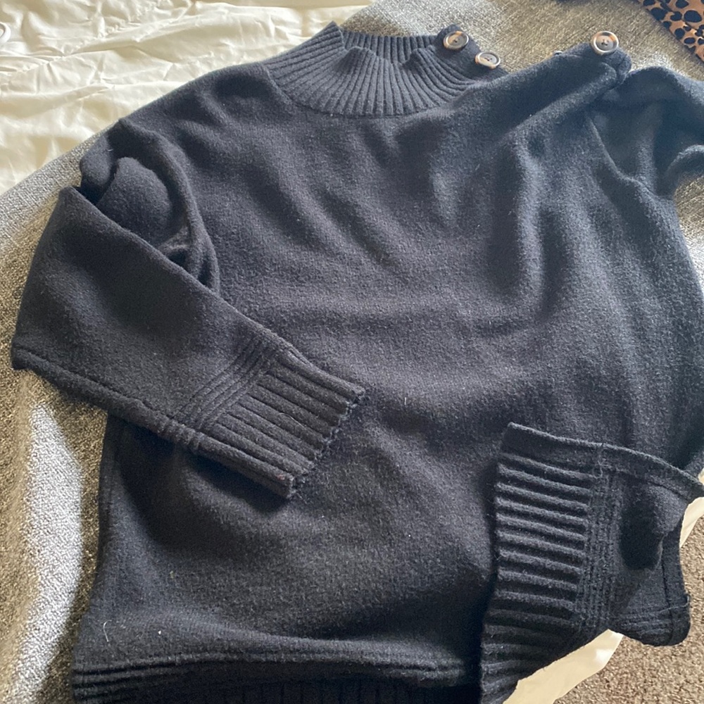 Anthropology size small women’s sweater. Tunic length, buttons and slit on side